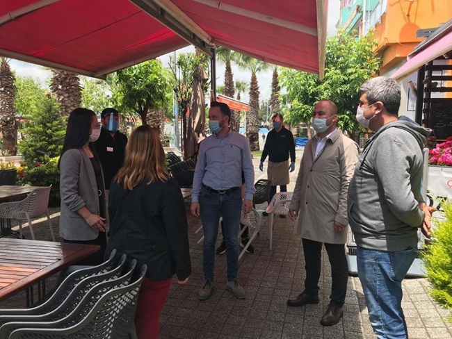 MHP'den esnafa 'hayırlı olsun' ziyareti